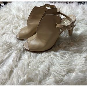 Vince Camuto Beige leather sling back heels with front slits. Very Versatile.